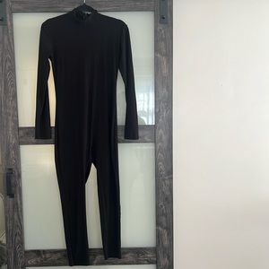Black turtle neck jumpsuit